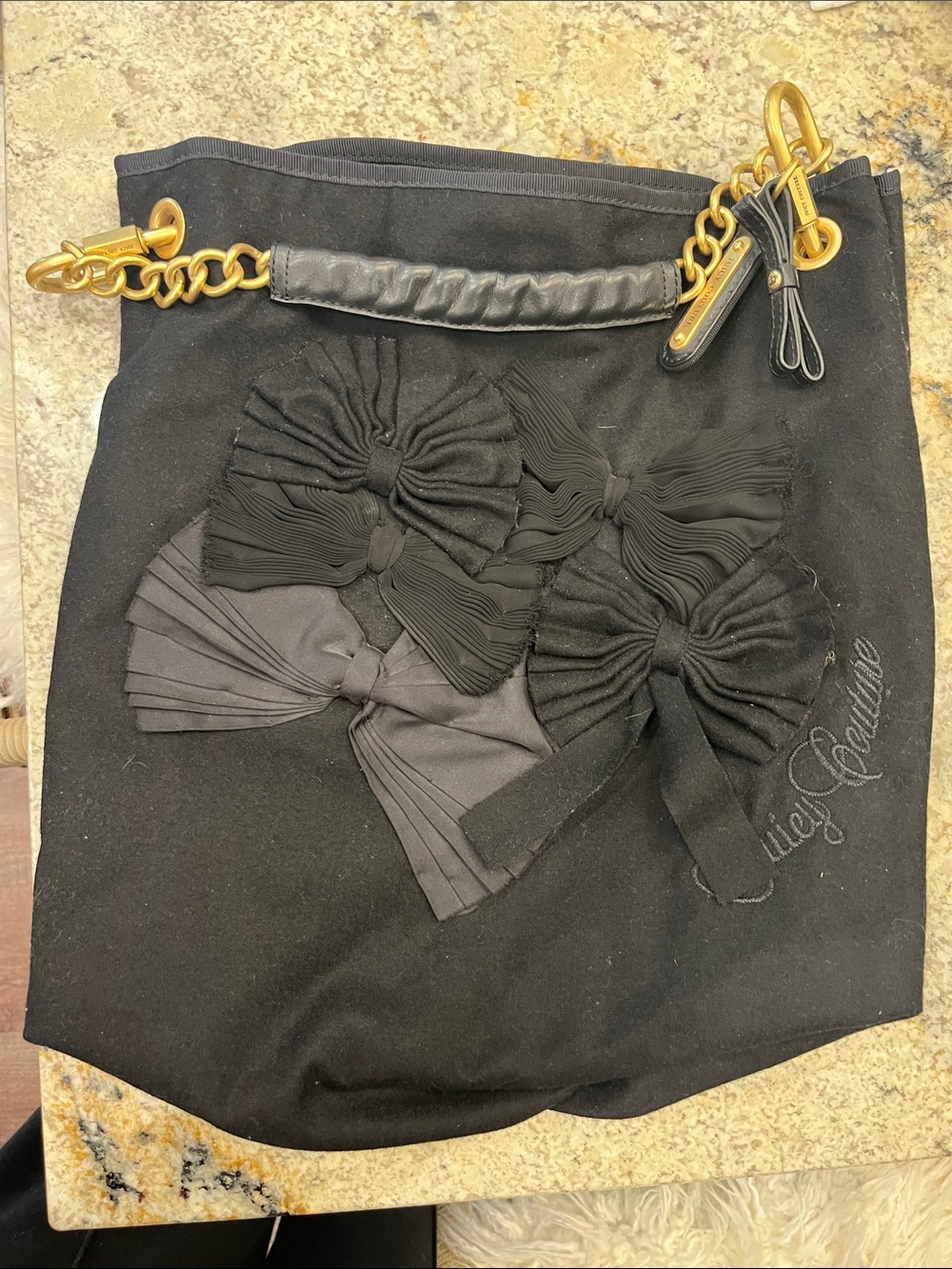 Juicy Couture black shoulder bag with pleated bow detailing and gold chain strap